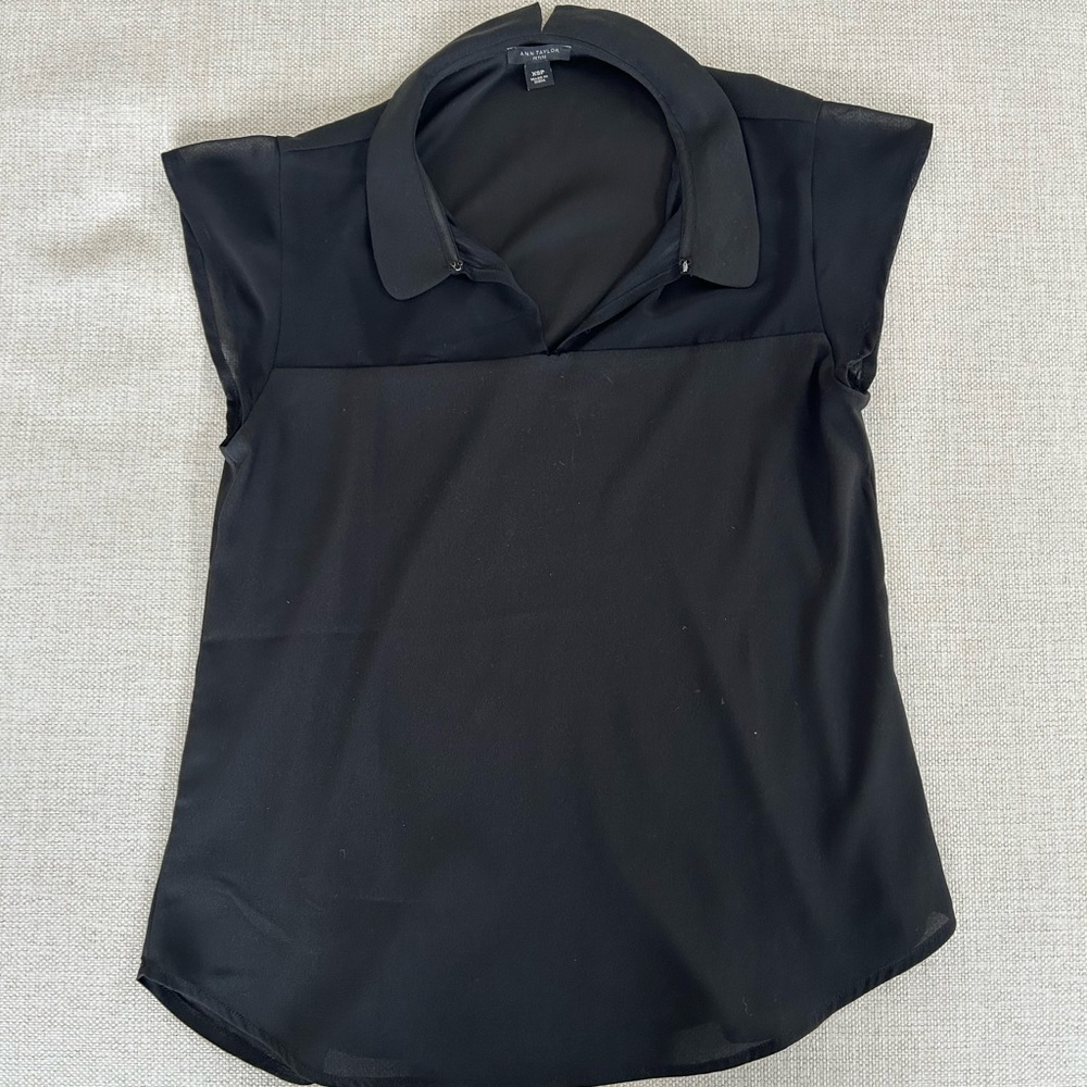 Ann Taylor XSP black top. Short sleeve. New without tags
